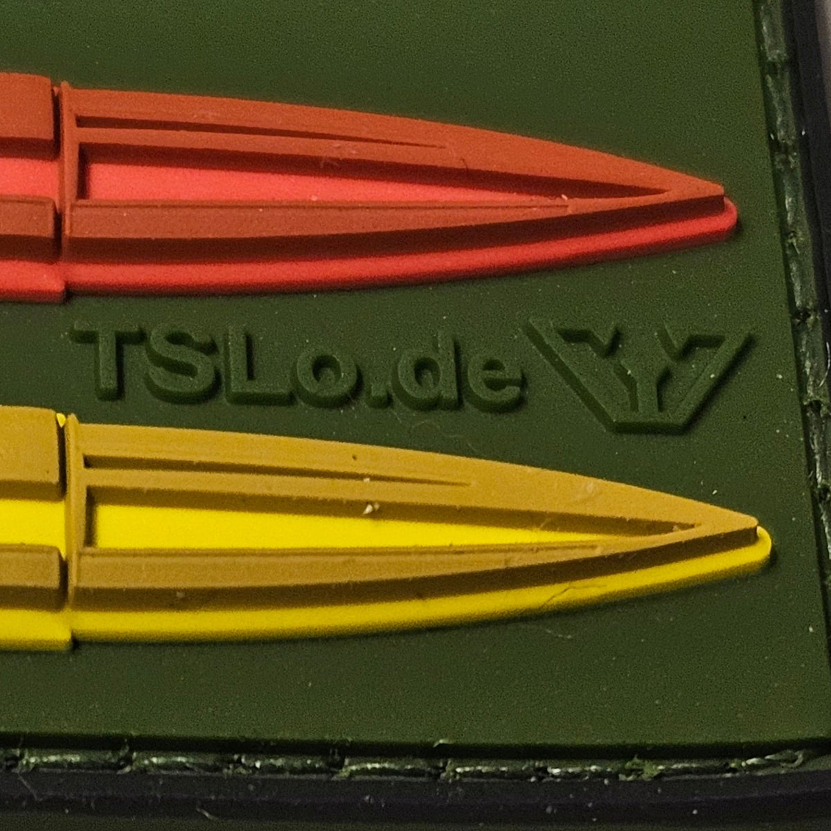 Tactical Solutions Lode Patronen Patch in 3D-Design mit Nato-Kürzel DEU auf olivgrünem Hintergrund